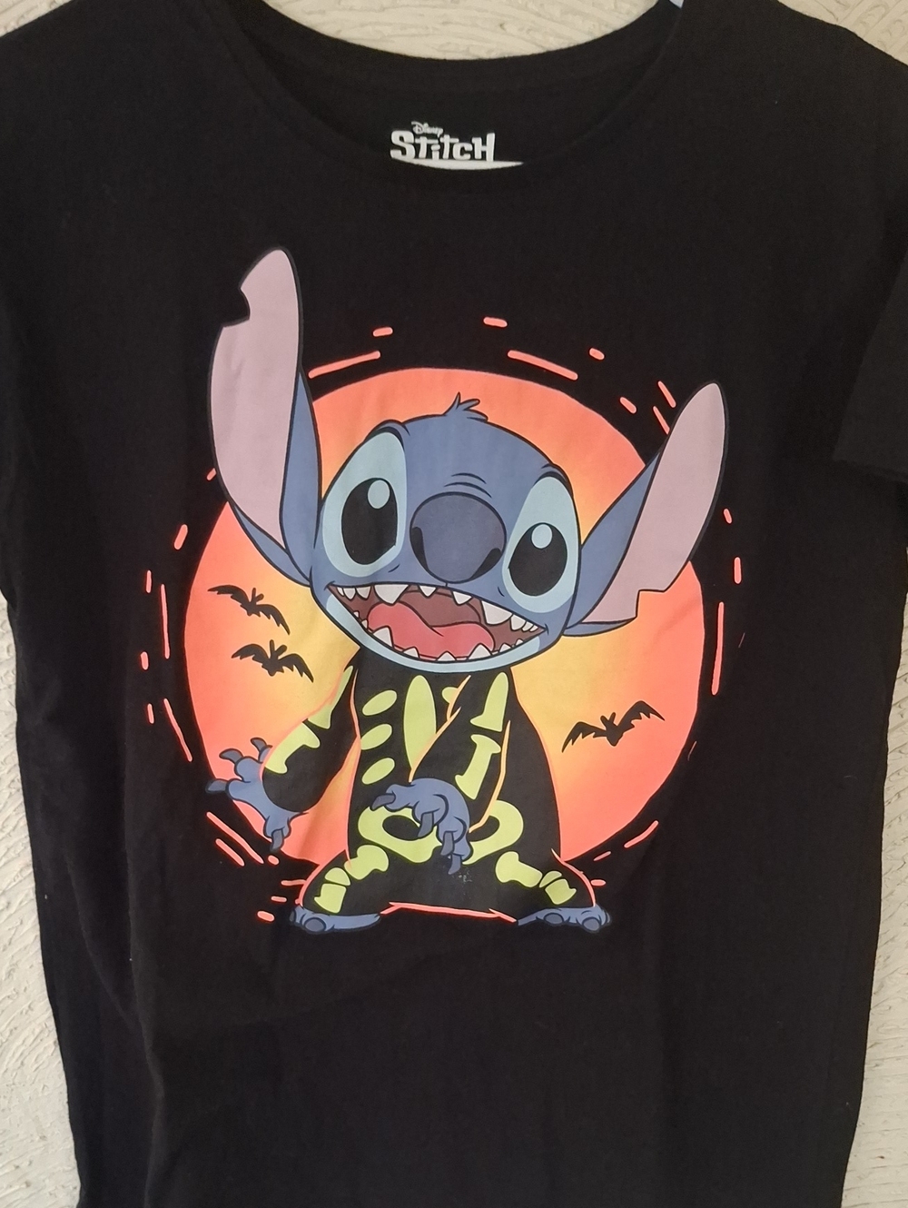 Disney Black Tee with Neon Stitch Skeleton Graphic